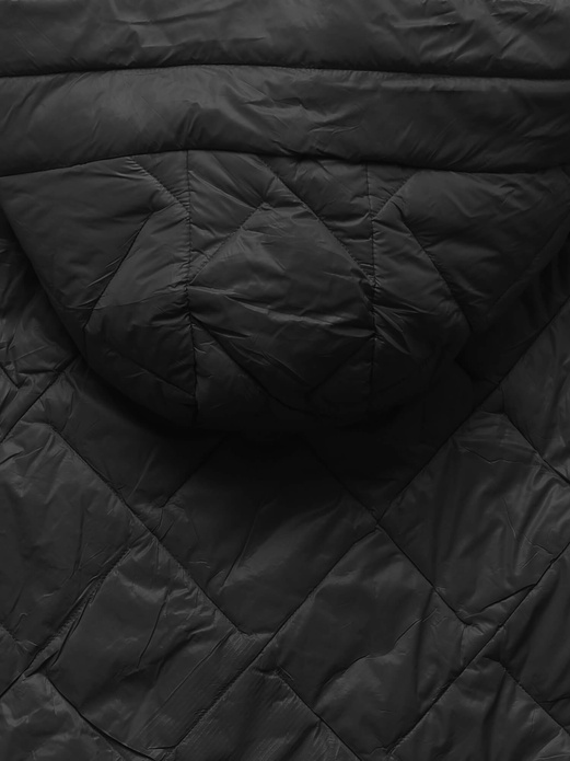 Czarna trapezowa pikowana przejściowa kurtka z dzianinowymi rękawami