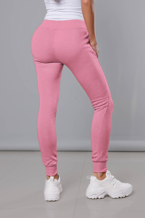 Jasnoróżowe damskie dresowe spodnie casualowe z kieszeniami i ściągaczem