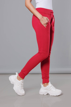 Malinowe damskie dresowe spodnie casualowe z kieszeniami i ściągaczem