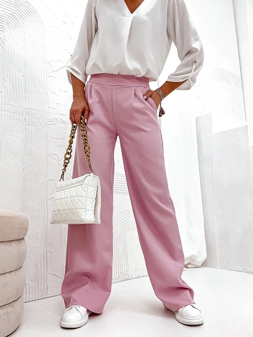 Pudrowe eleganckie luźne spodnie damskie