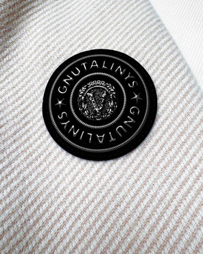 Beżowa damska kurtka przejściowa z kapturem w paseczki