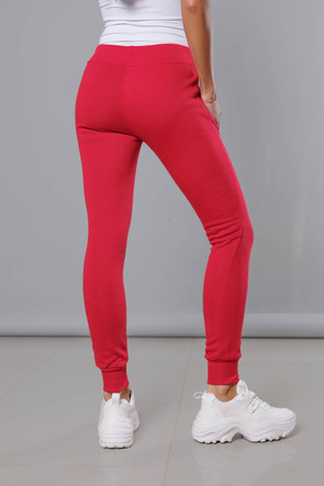 Malinowe damskie dresowe spodnie casualowe z kieszeniami i ściągaczem