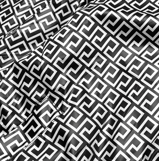 Zielona dwustronna przejściowa kurtka damska z kapturem geometryczne wzory