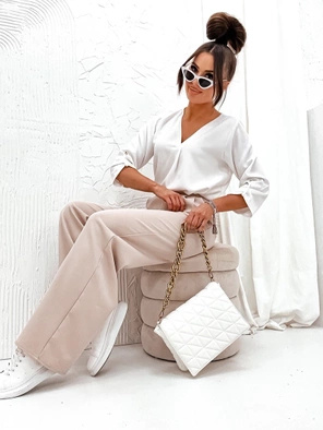 Beżowe eleganckie luźne spodnie damskie