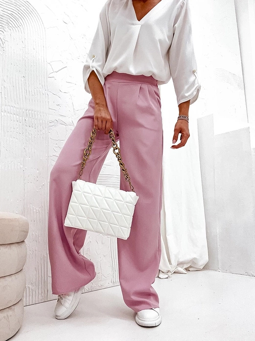 Pudrowe eleganckie luźne spodnie damskie