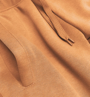 Musztardowe damskie dresowe spodnie casualowe z kieszeniami i ściągaczem