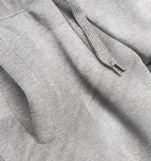 Szare damskie dresowe spodnie casualowe z kieszeniami i ściągaczem