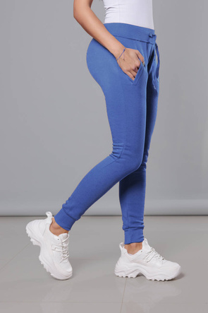 Niebieskie damskie dresowe spodnie casualowe z kieszeniami i ściągaczem