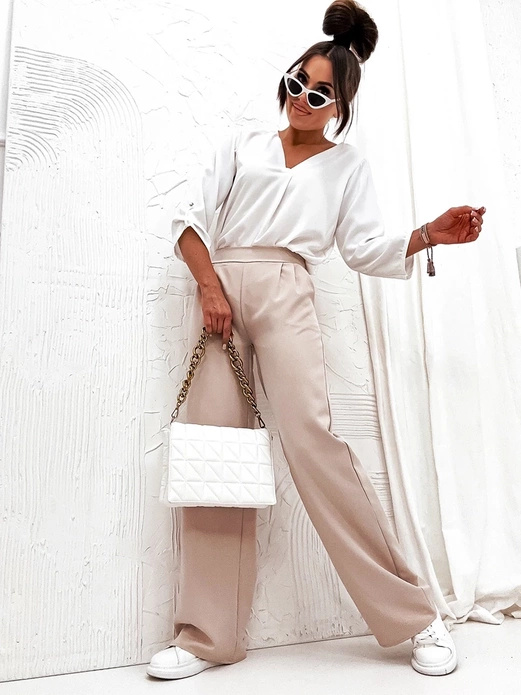 Beżowe eleganckie luźne spodnie damskie