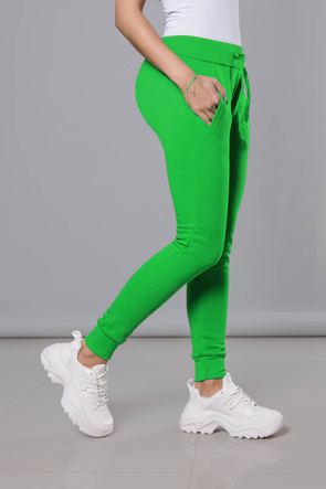Zielone damskie dresowe spodnie casualowe z kieszeniami i ściągaczem