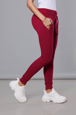 Bordowe damskie dresowe spodnie casualowe z kieszeniami i ściągaczem