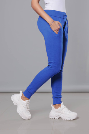 Niebieskie damskie dresowe spodnie casualowe z kieszeniami i ściągaczem
