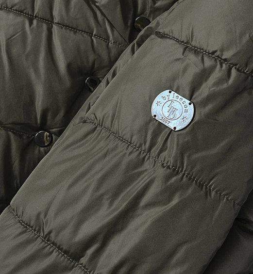 Ciemnozielona asymetryczna długa pikowana zimowa kurtka płaszczyk z kołnierzem