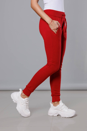 Czerwone damskie dresowe spodnie casualowe z kieszeniami i ściągaczem